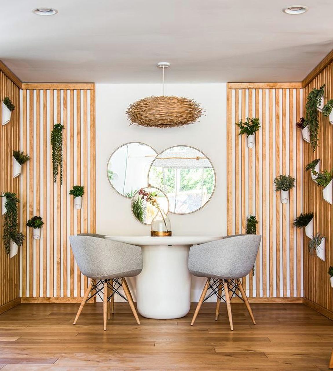 Dining nook with slatted walls at Nimbali