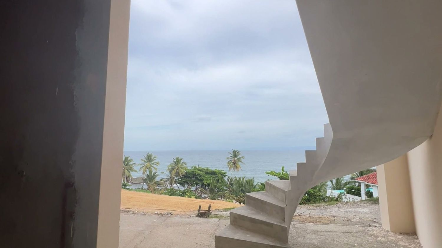 Cast concrete stair opening to Samaná Bay